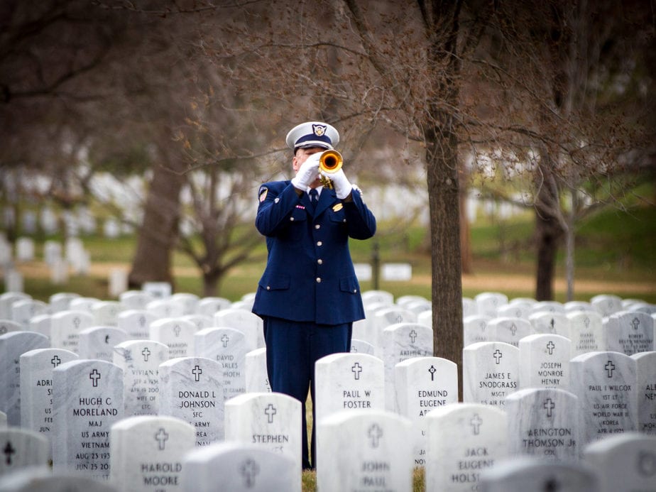 US Coast Guard Bugler in Arlington National Cemetery Section 55 | Arlington media, inc.