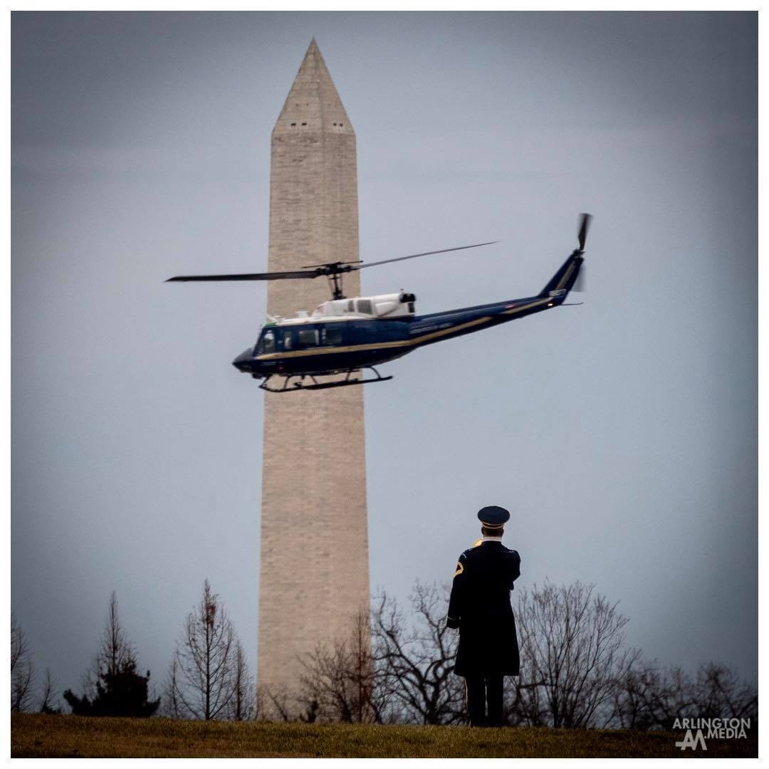 A US Air Force UH-1 (callsign Mussel) from the 1st Helicopter Squadron flying over Arlington National Cemetery’s Section 57 during the playing of Taps.

Joint Base Andrews The United States Army Band  3d U.S. Infantry Regiment (The Old Guard)  Arlington National Cemetery