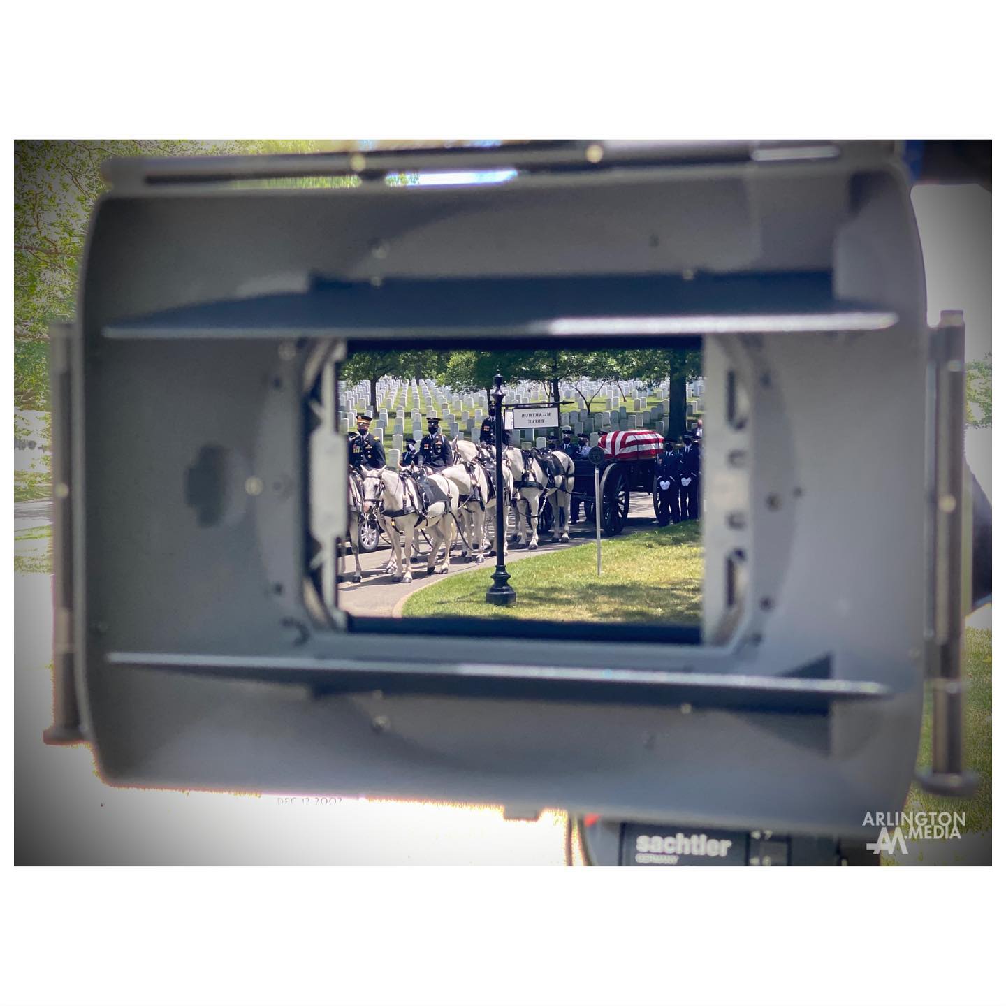 With the @usairforce @usafhonorguard and @usarmyoldguard caisson team getting ready for a transfer at Arnold Drive, as seen reflected through one of our lenses. This is one of the four services Arlington Media covered for families today. 

#Arlington⠀
#ArlingtonMedia⠀
#ArlingtonCemetery⠀
#ArlingtonNationalCemetery⠀