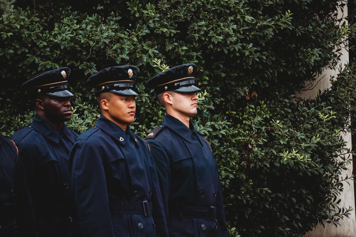 Charlie Company casket team members stand at the ready outside of the Old Post Chapel on Fort Myer Henderson Hall before marching into Arlington National Cemetery on a rainy morning.