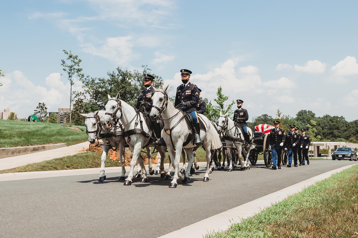 "The silence of the procession is broken only by the rhythmic clip-clop of the seven handsome horses. Astride four of the horses, Soldiers sit ramrod straight. The horses, head erect, bodies taut and controlled, seem to imitate the solemn military bearing of the men and women who sit quietly in the saddles."

-- The Military District of Washington