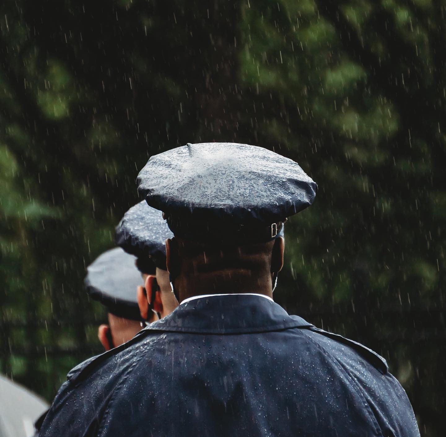 Rain or shine. Snow, sleet, or hail. Thunderstorm or blizzard. The airmen of The US Air Force Honor Guard stand ready to answer one of the nations most hallowed calls. 

With rain spilling off of their ceremonial caps, they honor America’s patriots and veterans on their final mission to their resting place in Arlington National Cemetery, Arlington, Virginia.