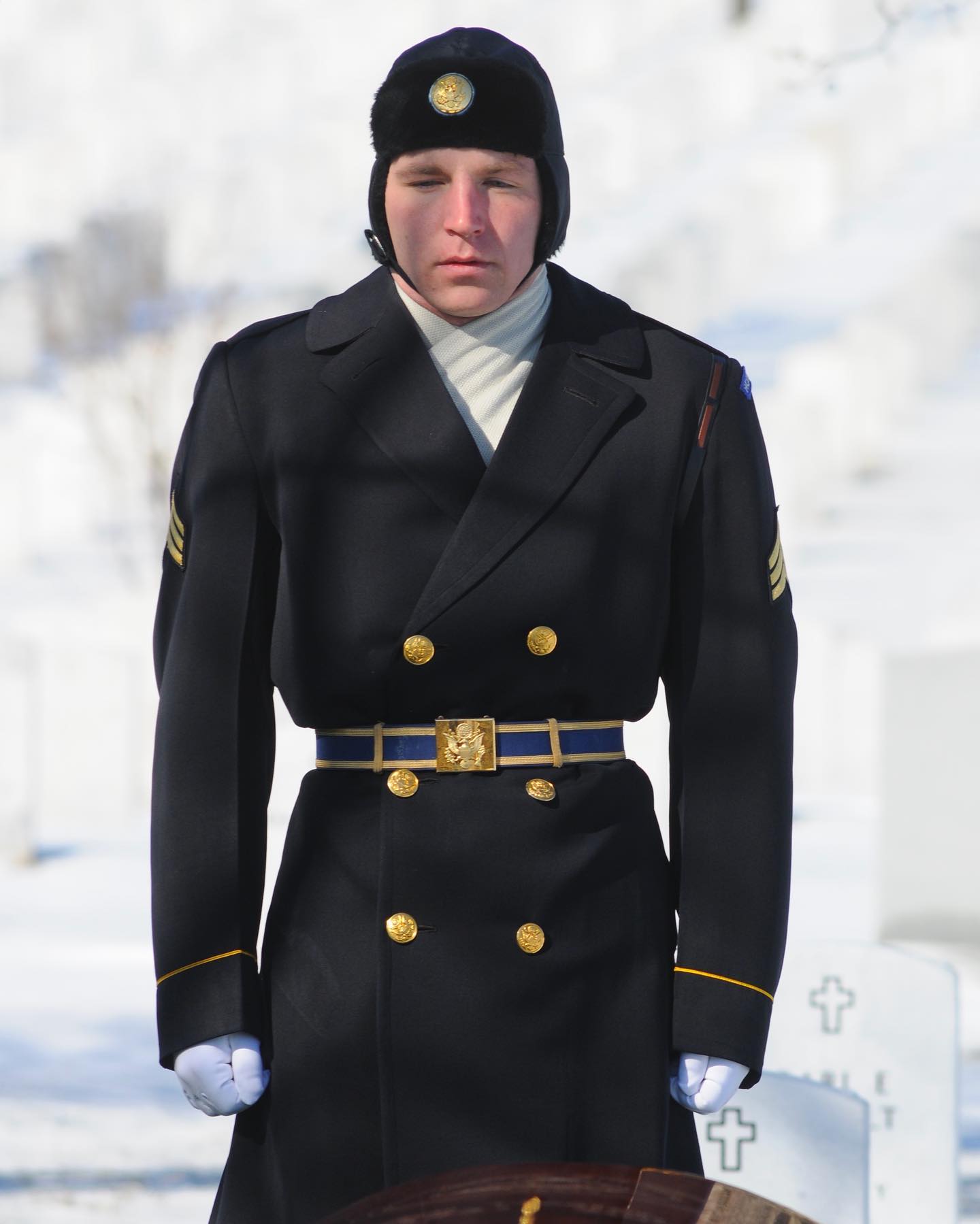Pictured above, a soldier in “The Old Guard”, honors a fallen veteran at Arlington National Cemetery. 

The 3d U.S. Infantry, traditionally known as "The Old Guard," is the oldest active-duty infantry unit in the Army, serving our nation since 1784.

The Old Guard is the Army's official ceremonial unit and escort to the president, and it also provides security for Washington, D.C., in time of national emergency or civil disturbance.

The unit received its unique name from Gen. Winfield Scott during a victory parade at Mexico City in 1847 following its valorous performance in the Mexican War. Fifty campaign streamers attest to the 3d Infantry's long history of service, which spans from the Battle of Fallen Timbers to World War II and Vietnam.

Since World War II, The Old Guard has served as the official Army Honor Guard and escort to the President. In that capacity, 3d Infantry soldiers are responsible for conducting military ceremonies at the White House, the Pentagon, national memorials and elsewhere in the nation's capital. In addition, soldiers of The Old Guard maintain a 24-hour vigil at the Tomb of the Unknowns, provide military funeral escorts at Arlington National Cemetery and participate in parades at Fort Myer and Fort Lesley J. McNair.

The black-and-tan "buff strap" worn on the left shoulder by each member of the 3d Infantry is a replica of the knapsack strap used by 19th-century predecessors of the unit to display its distinctive colors and distinguish its members from other Army units. The present buff strap continues to signify an Old Guard soldier's pride in personal appearance and precision performance that has marked the unit for 200 years.

A further distinction of The Old Guard is the time-honored custom of passing in-review with fixed bayonets at all parades. This practice, officially sanctioned by the War Department in 1922, dates to the Mexican War in 1847 when the 3d Infantry led a successful bayonet charge against the enemy at Cerro Gordo. Today, this distinction is still reserved for The Old Guard alone.