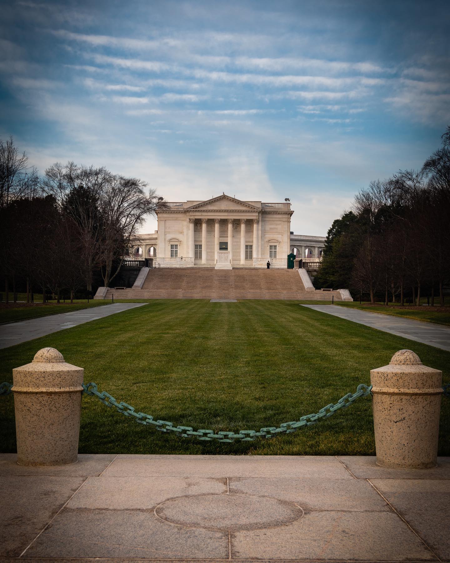 The Sentinels of the Tomb of the Unknown Soldier stand watch 24 hours a day, 365 days a year, in any weather. Sentinels, who volunteer for this post, are considered the elite of the elite 3rd U.S. Infantry Regiment (The Old Guard), headquartered at nearby Fort Myer, Virginia.

After members of the 3rd U.S. Infantry Regiment become ceremonially qualified, they are eligible to volunteer for duty as Sentinels at the Tomb. If accepted, they are assigned to Company E of The Old Guard. Each soldier must be in superb physical condition, possess an unblemished military record and be between 5 feet, 10 inches and 6 feet, 4 inches tall for men or 5 feet, 8 inches and 6 feet, 2 inches tall for women, with a proportionate weight and build.

Would-be Tomb Guards must first undergo an interview and a two-week trial. During the trial phase, they memorize seven pages of Arlington National Cemetery history. This information must be recited verbatim in order to earn a "walk." 

If a soldier passes the first training phase, "new soldier" training begins. New Sentinels learn the history of Arlington National Cemetery and the grave locations of nearly 300 veterans.They learn the guard-change ceremony, the manual of arms, and methods for keeping their uniforms and weapons in immaculate condition.

The Sentinels must pass multiple tests to earn the privilege of wearing the silver Tomb Guard Identification Badge. First, they are tested on their manual of arms knowledge, uniform preparation and walks. Then, they take the badge test, consisting of 100 randomly selected questions from the 300 items memorized during training. The would-be badge holder must get more than 95 % correct.

The Tomb Guard Identification Badge is a temporary award until the badge-holding Sentinel has honorably served at the Tomb of the Unknown Soldier for nine months. At that time, the award can become a permanent badge, which may be worn for the rest of a military career. The silver badge is an upside-down, laurel-leaf wreath surrounding a depiction of the Tomb's front face, the words "Honor Guard," and figures representing Peace, Victory and Valor. Over 600 Tomb Guards have earned the badge since the 1950s.