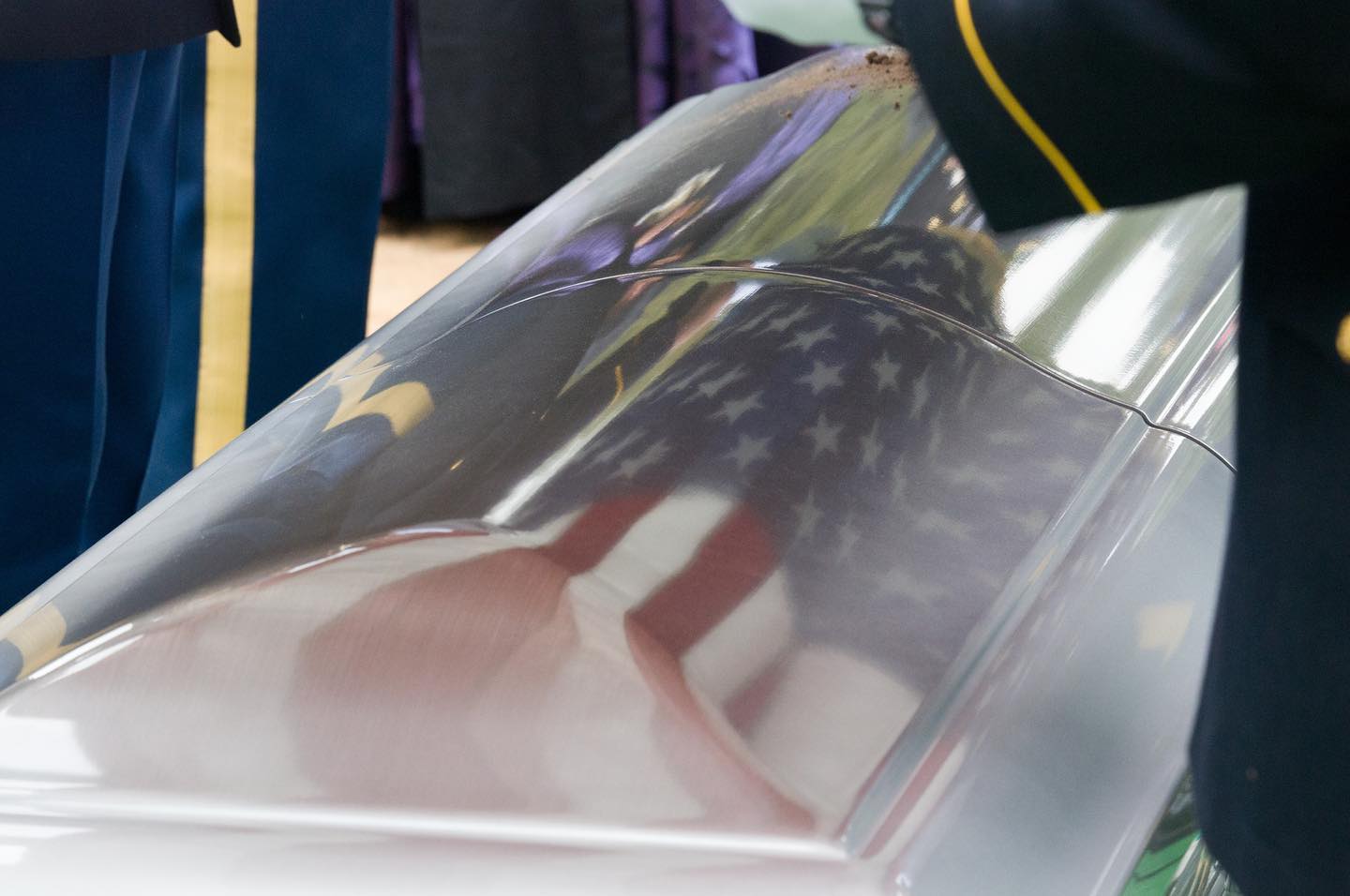 The reflection of a flag on the casket of an honored veteran being folded by members of the 3d US Infantry Regiment, The Old Guard, as captured by @arlingtonmedia photographers.

The Old Guard is responsible for memorial affairs missions which include standard and full honors funerals in Arlington National Cemetery and dignified transfers at Dover Air Force Base. Old Guard soldiers also perform all dignified transfers of fallen soldiers returning to the United States.

The Old Guard's ceremonial task list includes full honor arrivals for visiting dignitaries, wreath ceremonies at the Tomb of the Unknowns, and full honor reviews in support of senior army leaders and retiring soldiers.