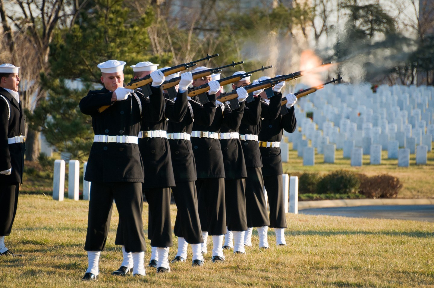 US Navy Rifle Platoon fires three volleys during a service at Arlington National Cemetery. 

Members of the Navy Ceremonial Guard participate in some of our nation’s most prestigious ceremonies, including Presidential inaugurations and arrival ceremonies for foreign officials.  In addition, the Navy Ceremonial Guard serves as the  funeral escort and conducts all services for Navy personnel buried in Arlington National Cemetery.

Tasking for ceremonies comes from the President of the United States, the Secretaries of Defense and the Navy, the Chairman of the Joint Chiefs of Staff, the Chief of Naval Operations, and the Commandant, Naval District Washington.  Navy Ceremonial Guard Sailors participate in numerous other military ceremonies at local commands.  Some elements of the command, such as the Drill Team and Color Guard, have represented the Navy in public events across the nation and around the world.