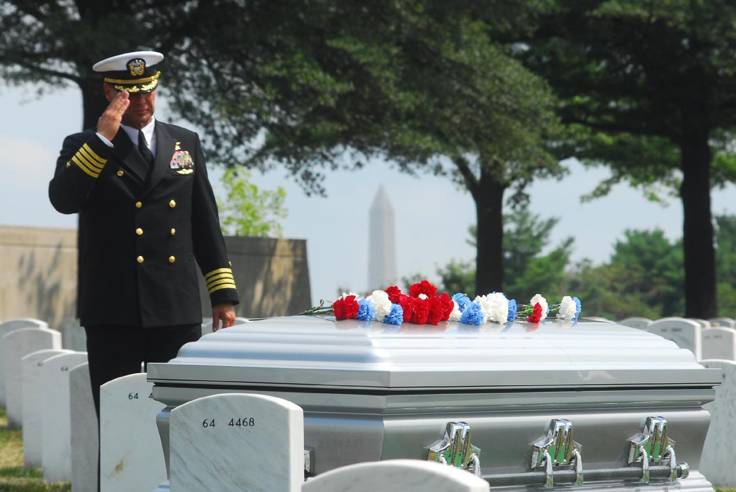 A US Navy Captain salutes the remains of an honored veteran, laid to rest in Section 64 of Arlington National Cemetery. 

Captured by @arlingtonmedia