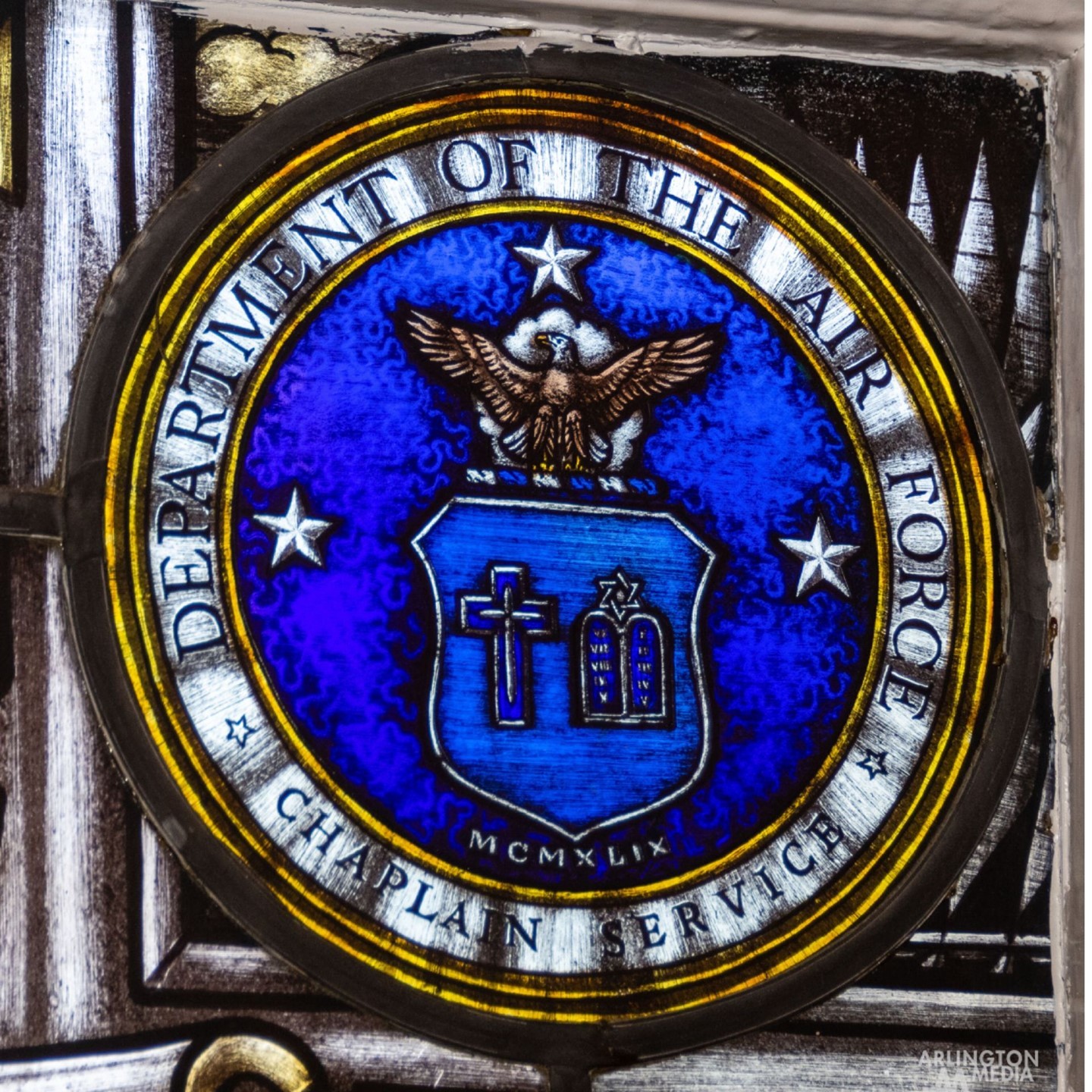 The stained glass windows on the south side of the Old Post Chapel honor the branches of the armed forces and include scenes from the Old Testament.  A small plaque is placed below each window with an inscription naming the organization that donated the window and the branch of military service being honored.

The Army Service window portrays Joshua at the battle of Jericho.  The plaque reads, “This window is donated by the members of the Class of 1940, United States Military Academy, in tribute to all those now and in the future who have or will have served their country in the United States Army.”

The Marine Corps Service window shows Gideon and his army.  The plaque reads, “This window is donated by the United States Marine Corps and dedicated to the memory of all Marines who have died since the founding of the Corps on 19 November 1775.”

The Navy Service window depicts Solomon at the building of the Temple at Jerusalem.  The plaque reads, “This window is donated by the members of the United States Naval Academy Class of 1940 in tribute to all who have served in the United States Navy.”

The Air Force Service window illustrates the prophet Isaiah and the quotation, “they shall rise up with wings as an eagle.” The plaque reads, “This window was contributed by the chapel congregations of the Air Force, Protestant, Catholic and Jewish, in memory of all airmen, male and female, officer and enlisted, who gave their lives in the service of their country.”

The Coast Guard Service window portrays Noah’s Ark.  The plaque reads, “This window is donated by the United States Coast Guard Academy Alumni Association in memory of all those who willingly, bravely and faithfully served their country and perpetuated the proud traditions of our Nation’s smallest Armed Force.”

The stained glass windows on the north side of the chapel were donated by service Chiefs of Chaplains.