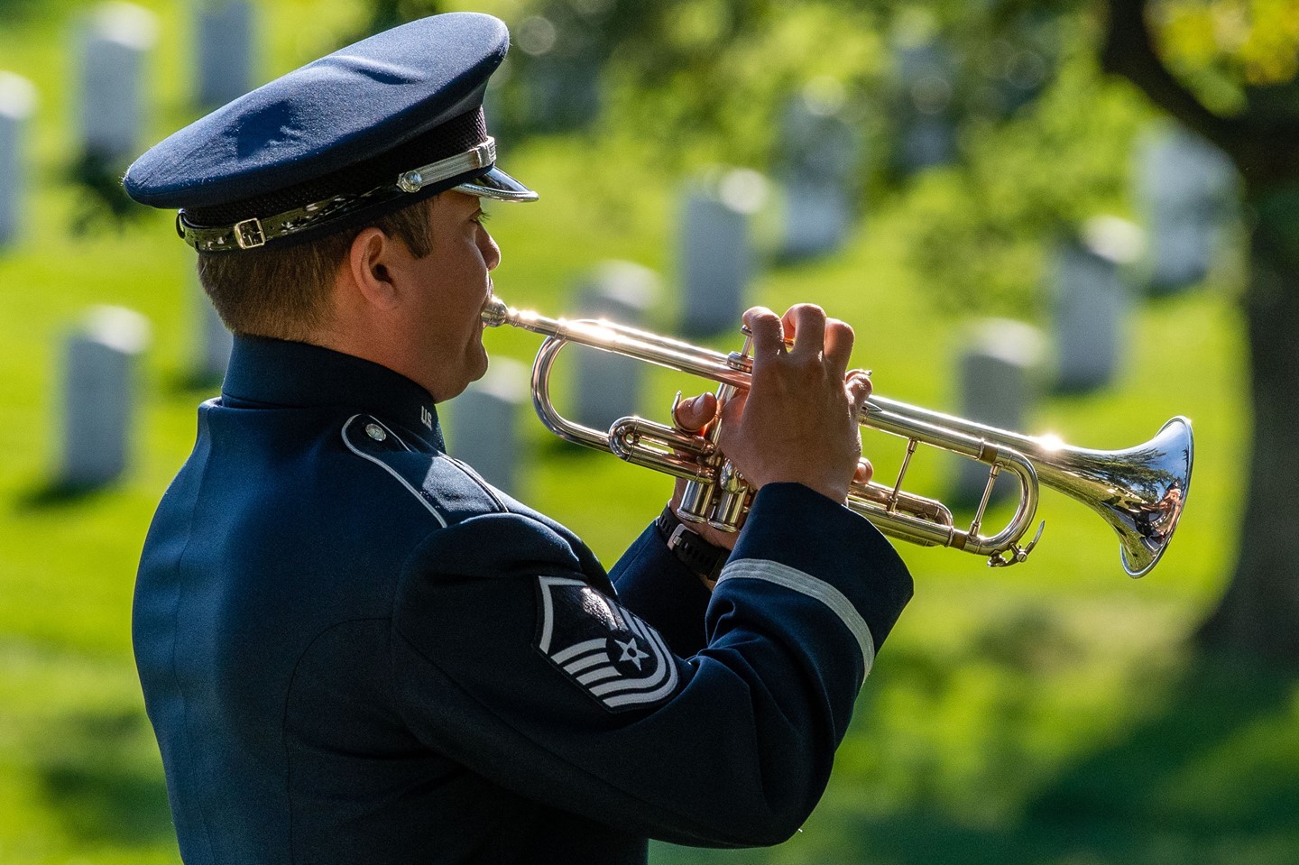 Taps originated in the military during the Civil War, when Union General Daniel Butterfield wanted a more solemn call to signal the day’s end. Together with Oliver Wilcox Norton, they wrote the tune we use today, to honor the men in camp at Harrison’s Landing in Virginia, and it was made official following the war.

After taps is performed, the ceremonial band plays America the Beautiful while the flag is folded and presented to the family.

There are so many requests for funerals at Arlington that families can wait up to eight months to bury their loved one. But when a soldier is killed in action, they move to the top of the list.

Earlier this year, the cemetery announced newly proposed eligibility requirements that limit burials to service members killed in action, former POWs, prestigious figures such as Purple Heart recipients, presidents and vice presidents, according to WAMU. The changes come as Arlington struggles to stay active amid space limitations.

There’s nothing easy about serving in a military funeral. But for the band, proximity to young families who have lost a soldier in combat can be difficult to watch.

“I remember a job, with a young soldier who passed away, and we were playing, and she [his wife] ran up to the casket and tried to hug it. And when you’re close enough to witness things like that, it puts it all in perspective,” said Staff Sgt. Alicia Eisenstadt, a bugler with the Army Band.

Taps is a no-fail mission. Buglers can’t crack a note. It doesn’t matter what happens when they’re playing. They have to be laser-focused on the mission. But it’s not like other musical performances, where you’re playing for an audience.

“You want to have a good Taps so you can say you really did justice to that family,” Eisenstadt said.

“The entire nation is expecting something from you.”