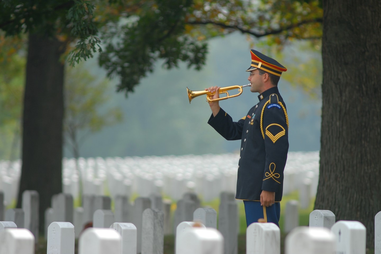 A bugler plays the lonesome call of Taps during a service covered by @arlingtonmedia

The bugle call known as "Taps" dates from the American Civil War. In July 1862, while the Army of the Potomac camped near Harrison's Landing, Virginia, Brigadier General Daniel Butterfield summoned Private Oliver Wilcox Norton, his brigade bugler, to his tent. Butterfield, who disliked the colorless "lights out" call then in use, whistled a different tune and asked the bugler to play it for him. After repeated trials, Norton played a 24-note call which suited the general. (According to some interpretations, Butterfield's tune was a variation on an earlier bugle call, the "Scott Tattoo," first published in 1835.) Butterfield then ordered that within his brigade, the new call would replace the regulation Army Taps. The next day, buglers from nearby brigades came to the camp of Butterfield's brigade to ask about the new call. They liked the tune and copied the music. During the Civil War, its popularity spread throughout Union ranks, and even among some Confederate forces.

Shortly after Butterfield composed the tune, Taps was first sounded at a military funeral for a Union cannoneer killed in action. The deceased soldier's commanding officer believed that a bugle call would be less risky than the traditional three-rifle volley, which the enemy could misinterpret as an attack. In 1874, Butterfield's Taps became the U.S. Army's official bugle call. Taps has been used by the U.S. armed forces ever since — at the end of the day, during flag ceremonies and at military funerals. Whenever a service member is buried with military honors anywhere in the United States, the ceremony concludes with the three-rifle volley and the sounding of Taps on a trumpet or bugle. Melancholy yet serene, the call lingers in memory.

The name "Taps" derives from the fact that the lights-out call was traditionally followed by three drum taps.