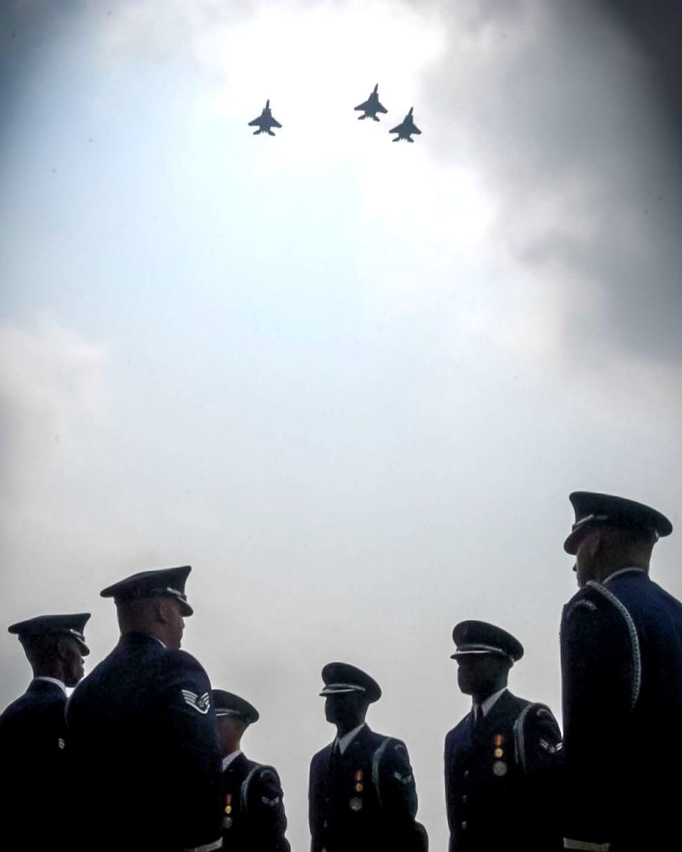 A flyover during a hazy day at Arlington National Cemetery captured by the @arlingtonmedia team.