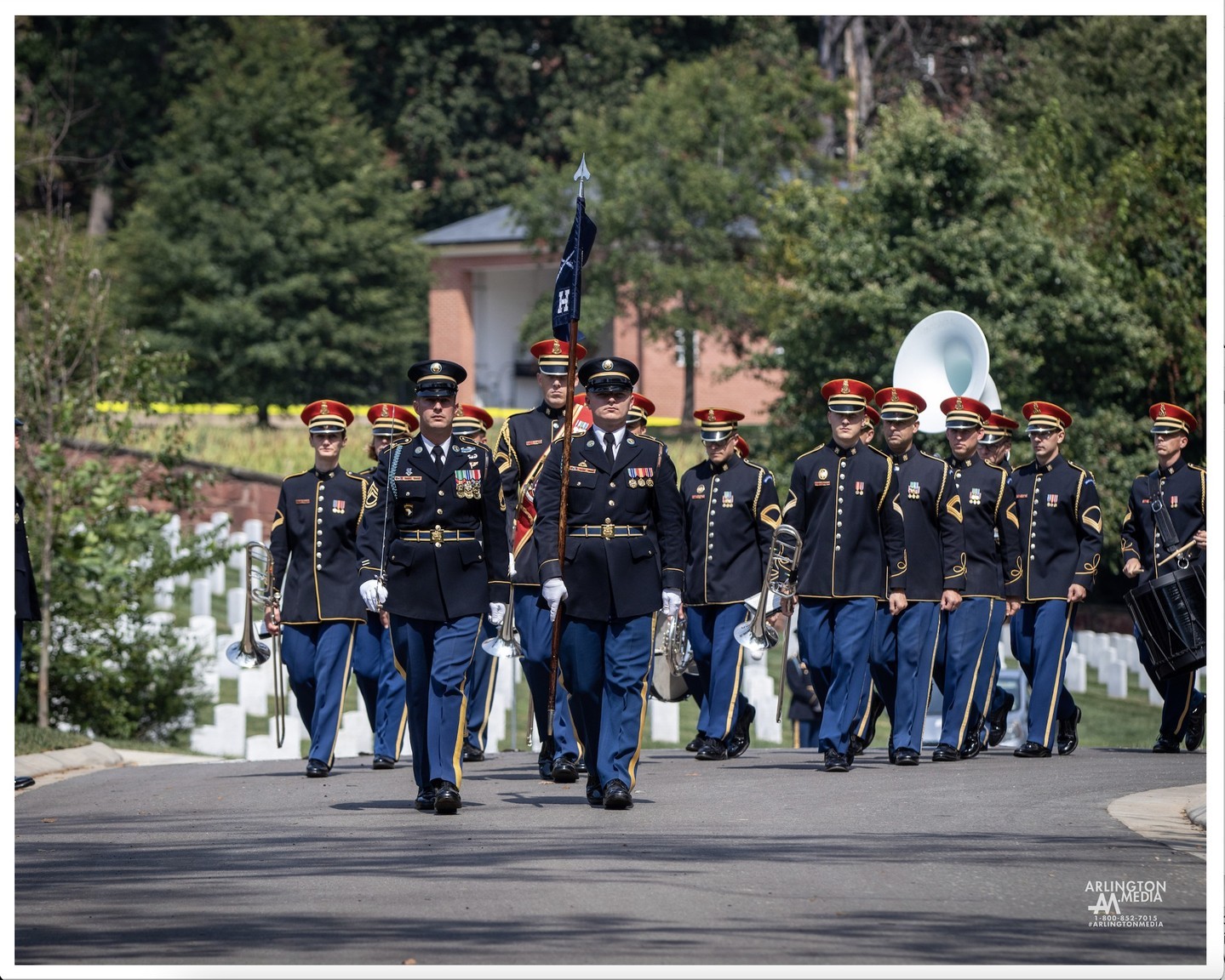 A US Army escort commander leads the escort platoon and @usarmyband to the graveside site during a full honors service in Arlington National Cemetery in Arlington, Virginia.