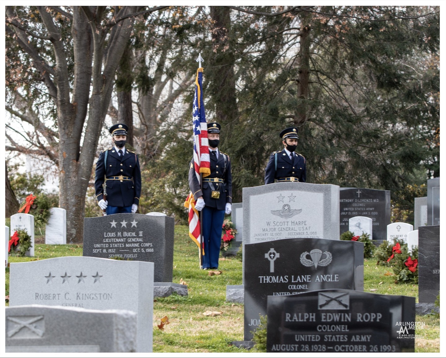 As winter descends in Arlington National Cemetery, the graves get adorned  with a familiar sight each
