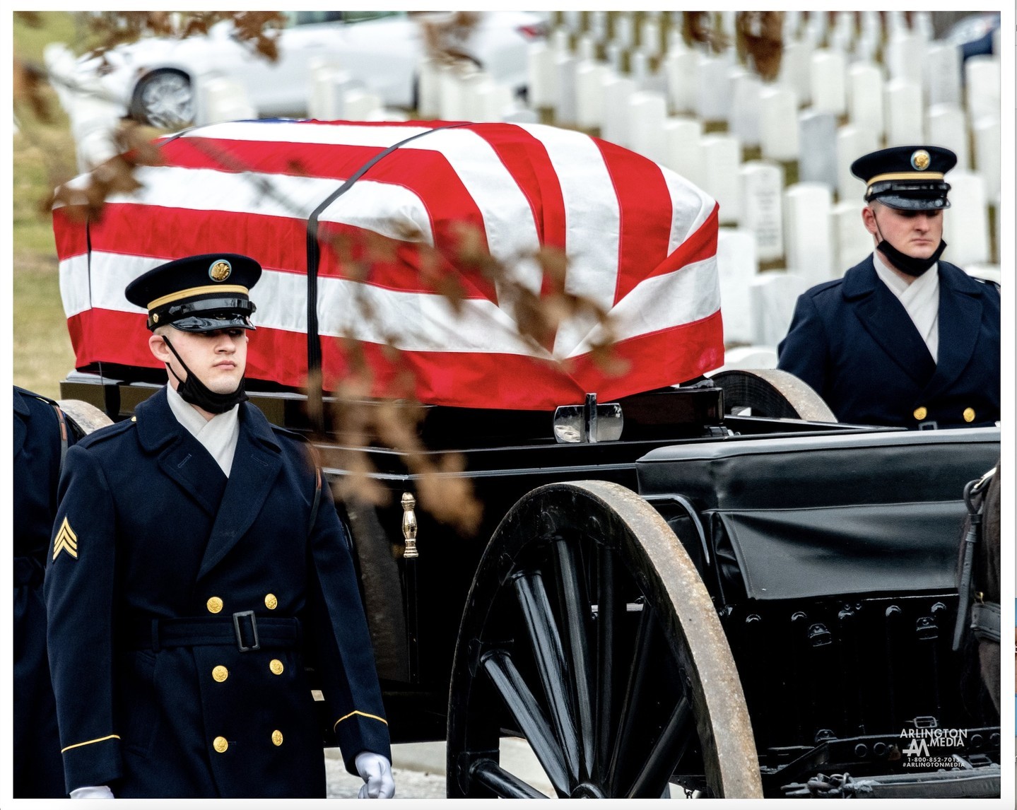 American flags have been draped over military veterans' coffins since the Napoleonic Wars in the late 1700s and early 1800s.  The custom is rich with tradition and requires a certain protocol.

Flags draped over coffins honor the memory of military members who serve the United States, according to the U.S. Department of Veterans Affairs.  Most veterans and active-service members of the military qualify for flag-draped coffins at their funerals.  The Department of Veterans Affairs states that veterans with dishonorable discharges are not eligible for an official burial flag.

Burial flags should never touch the ground, and when being used to drape a coffin, should never be lowered into the grave.  The flag should be removed from the casket and folded into a triangle with only the union, or the blue field, showing.  It will then be given to the deceased's next of kin, friend or specified dependent.