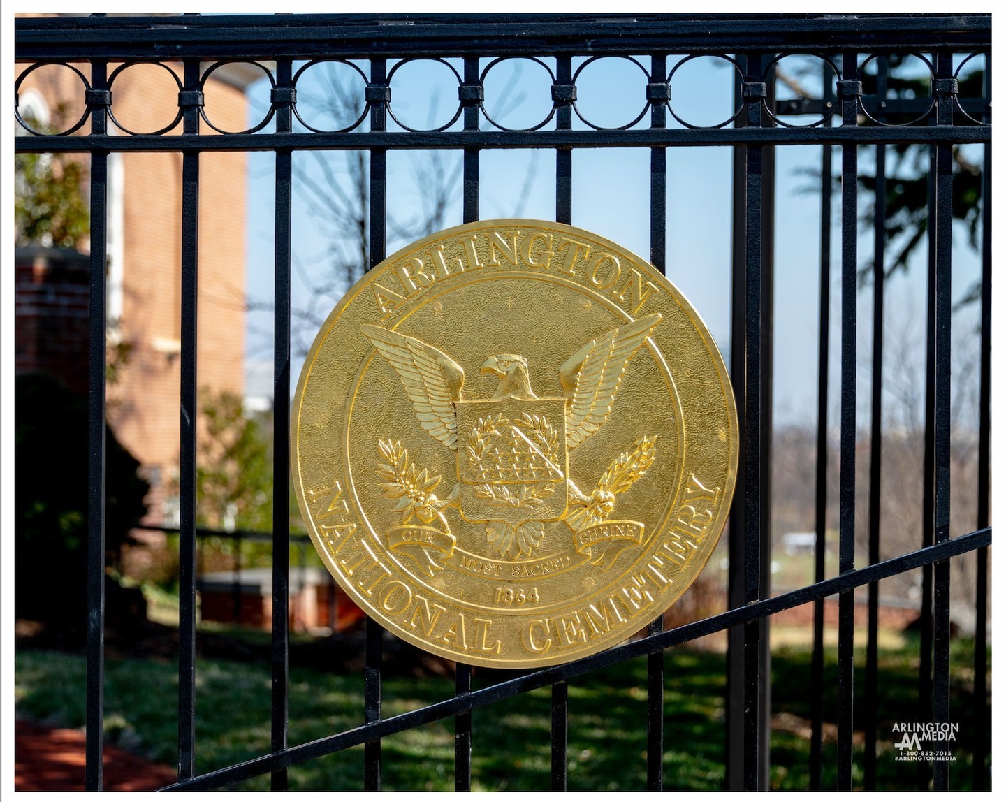 The Arlington National Cemetery symbol on the gate between Fort Myer Henderson Hall and Arlington National Cemetery.  This gate serves as the entrance point for honored veterans and family members passing into the cemetery from services held at The Old Post Chapel on Fort Myer.